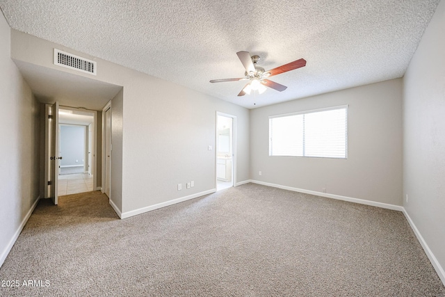 7439 E Ed Rice Ave, Mesa, AZ 85208 - spare room featuring carpet floors, ceiling fan, a textured ceiling, and baseboards