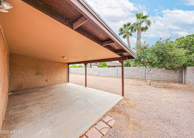 7439 E Ed Rice Ave, Mesa, AZ 85208 - fenced backyard with a patio area