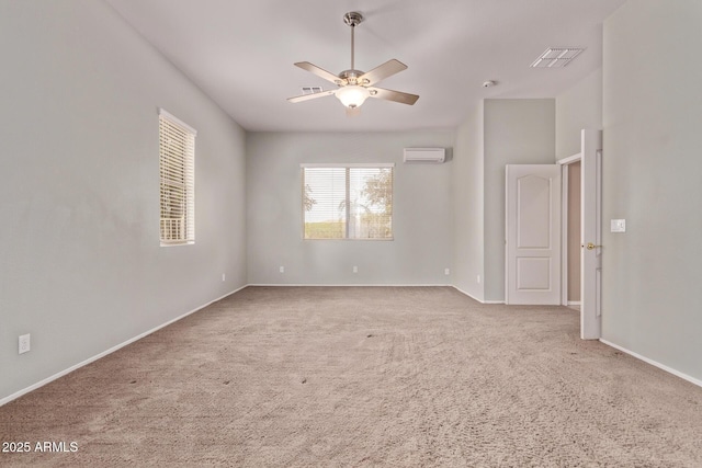 21373 N 94th Ave, Peoria, AZ 85382 - carpeted spare room featuring baseboards, ceiling fan, a wall unit AC, and visible vents