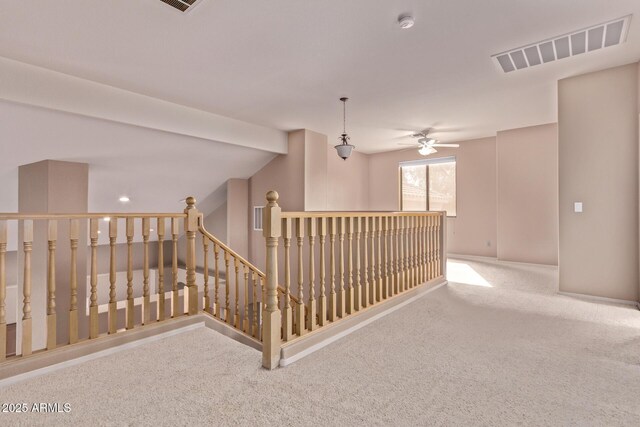 21373 N 94th Ave, Peoria, AZ 85382 - hall with visible vents, carpet flooring, and an upstairs landing