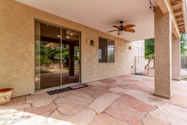 21373 N 94th Ave, Peoria, AZ 85382 - view of patio featuring a ceiling fan and fence