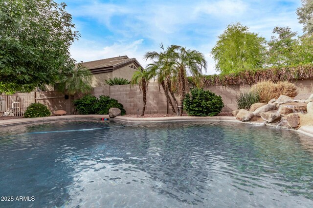 21373 N 94th Ave, Peoria, AZ 85382 - view of pool with a fenced in pool and a fenced backyard