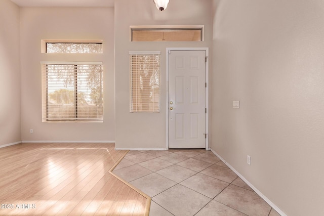 21373 N 94th Ave, Peoria, AZ 85382 - foyer with baseboards and light wood-type flooring