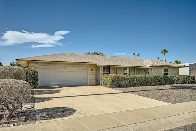 single story home featuring a garage