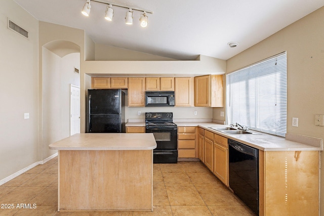 kitchen with black appliances, light brown cabinetry, a sink, and visible vents