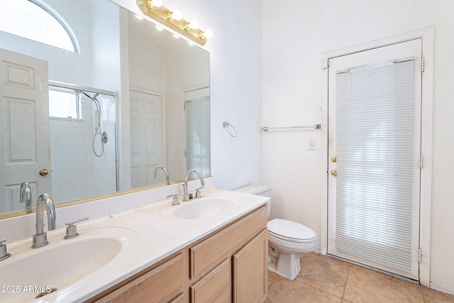 full bathroom with toilet, a shower with door, a sink, and tile patterned floors