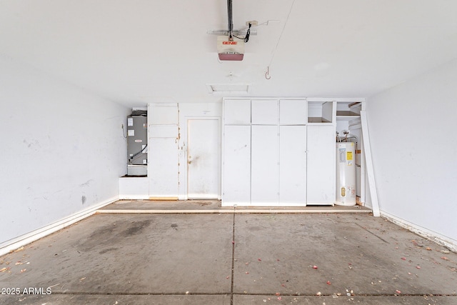 garage with a garage door opener and electric water heater