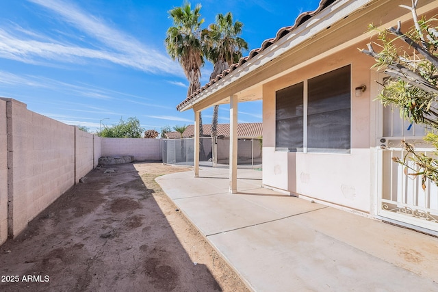 view of patio featuring a fenced backyard