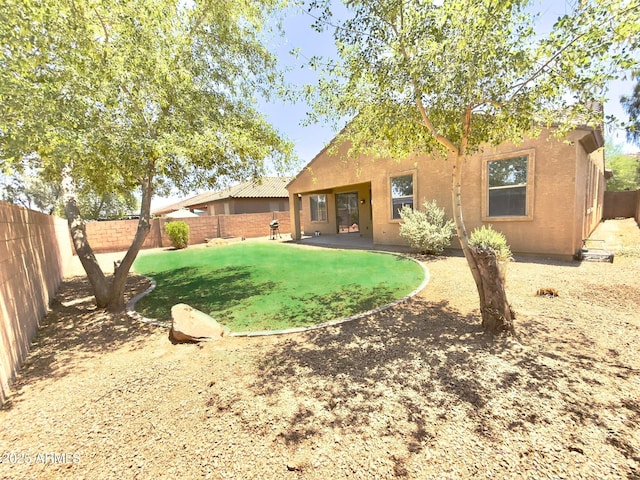7116 W Sophie Ln, Laveen, AZ 85339 - back of house featuring stucco siding
