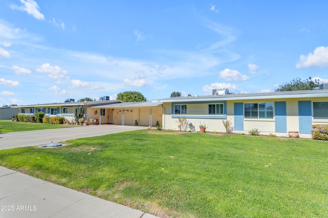 single story home with a garage, a front yard, concrete driveway, and brick siding