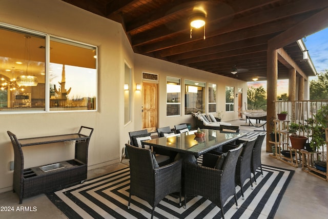 view of patio featuring outdoor dining area