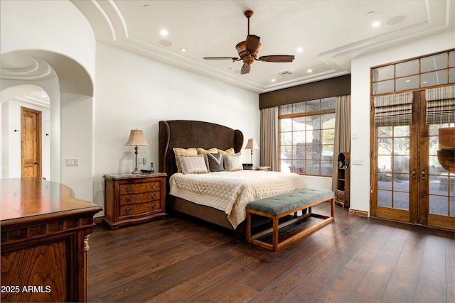 bedroom with access to outside, dark hardwood / wood-style floors, and ceiling fan