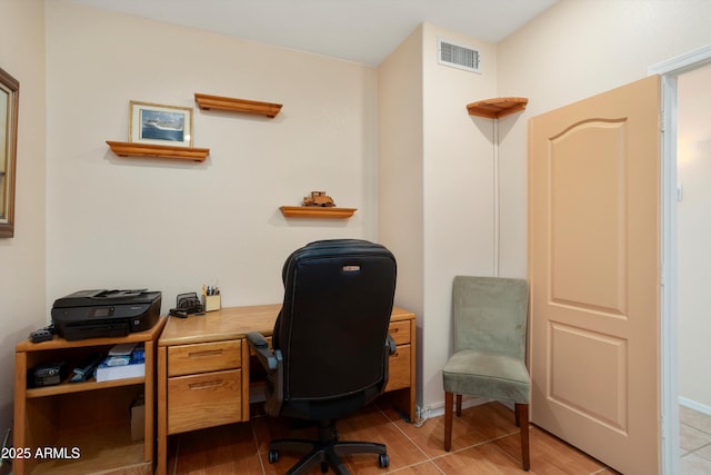 office featuring light wood finished floors and visible vents