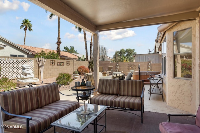 view of patio / terrace featuring a fenced backyard and an outdoor living space