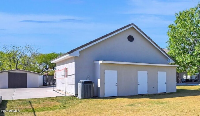 garage featuring central AC unit