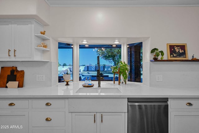 kitchen with white cabinets, dishwasher, light countertops, and open shelves