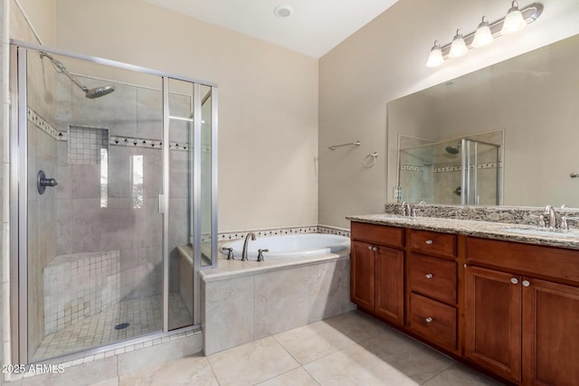 bathroom with shower with separate bathtub, tile patterned floors, and vanity