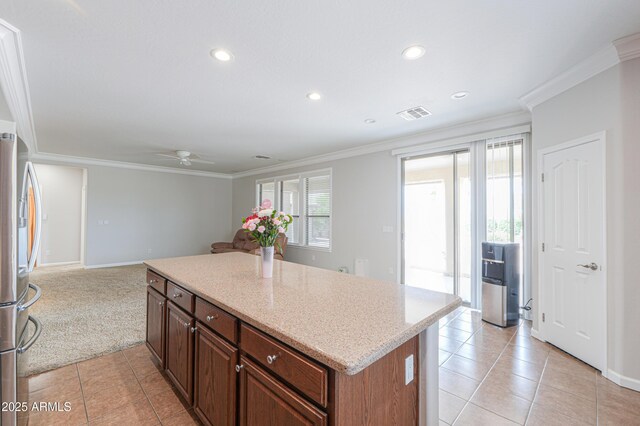 40232 W Marion May Ln, Maricopa, AZ 85138 - kitchen featuring stainless steel fridge, light tile patterned floors, ceiling fan, crown molding, and recessed lighting