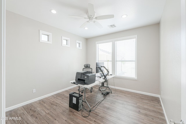 40232 W Marion May Ln, Maricopa, AZ 85138 - office space featuring healthy amount of natural light, a ceiling fan, baseboards, wood finished floors, and recessed lighting