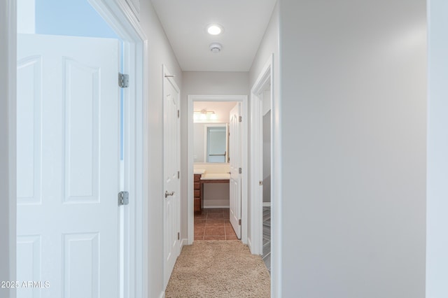 40232 W Marion May Ln, Maricopa, AZ 85138 - corridor featuring carpet flooring and baseboards