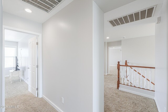 40232 W Marion May Ln, Maricopa, AZ 85138 - hallway with carpet, an upstairs landing, baseboards, and recessed lighting