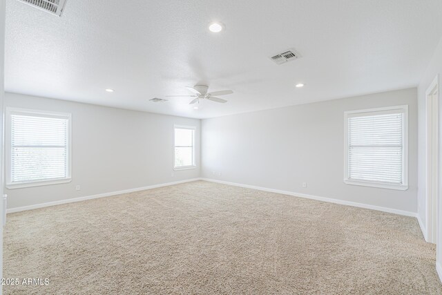 40232 W Marion May Ln, Maricopa, AZ 85138 - spare room featuring carpet, ceiling fan, baseboards, and recessed lighting