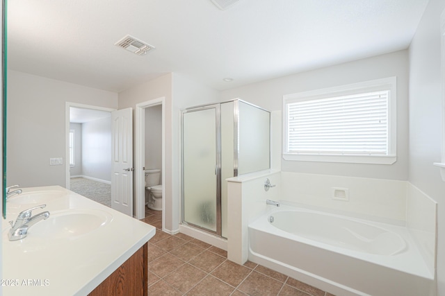 40232 W Marion May Ln, Maricopa, AZ 85138 - bathroom with toilet, a bath, a stall shower, tile patterned flooring, and double vanity