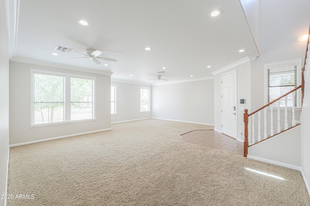 40232 W Marion May Ln, Maricopa, AZ 85138 - unfurnished living room with light colored carpet, crown molding, a ceiling fan, recessed lighting, and baseboards
