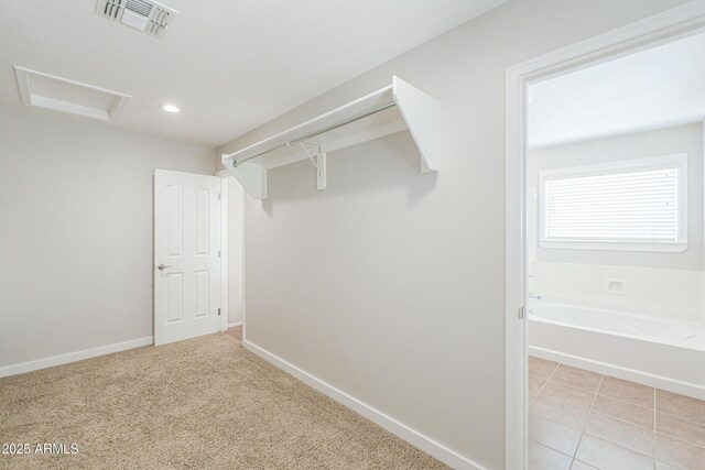 40232 W Marion May Ln, Maricopa, AZ 85138 - spacious closet featuring attic access
