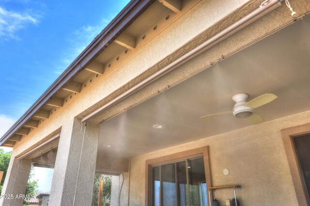40232 W Marion May Ln, Maricopa, AZ 85138 - exterior view of ceiling fan and stucco siding