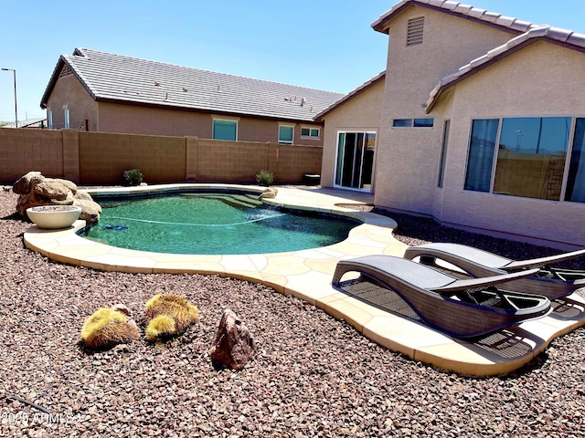 5749 S 247th Dr, Buckeye, AZ 85326 - view of pool with a fenced backyard and a patio area
