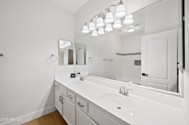1748 E Cortez Dr, Gilbert, AZ 85234 - full bathroom featuring a sink, baseboards, double vanity, and visible vents