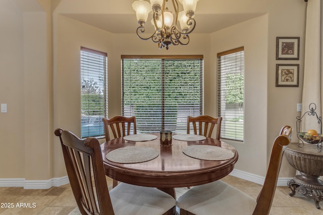 6870 S Justin Way, Chandler, AZ 85249 - dining space featuring a chandelier and baseboards