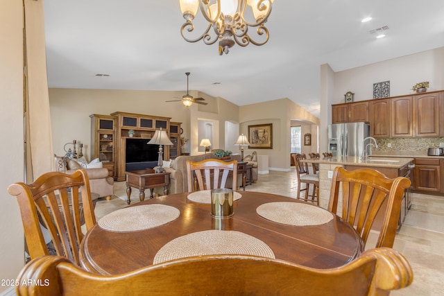 6870 S Justin Way, Chandler, AZ 85249 - dining space with ceiling fan, arched walkways, a chandelier, and vaulted ceiling