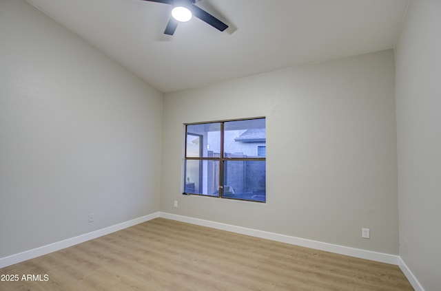 spare room featuring ceiling fan and light wood-type flooring