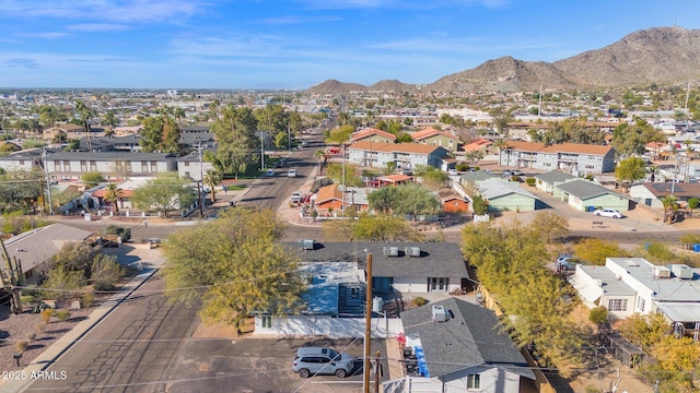 drone / aerial view featuring a mountain view