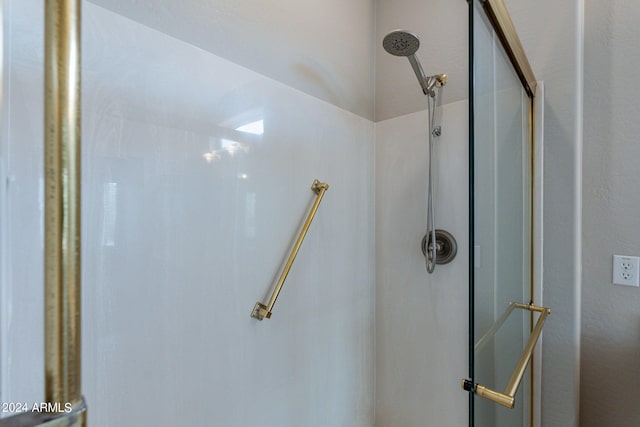 full bathroom with a shower stall