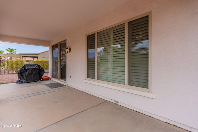 view of patio / terrace with fence and grilling area