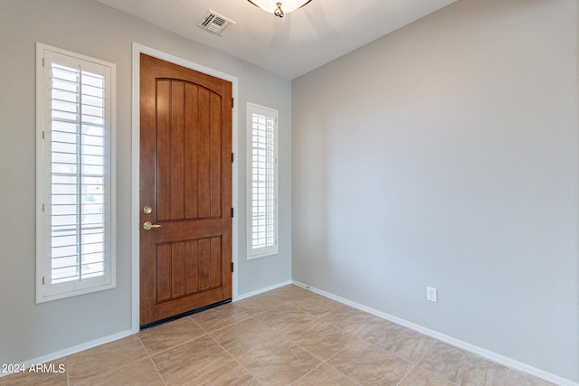 entrance foyer with visible vents and baseboards