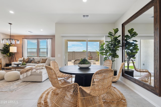 dining space featuring a wealth of natural light, visible vents, recessed lighting, and light tile patterned floors