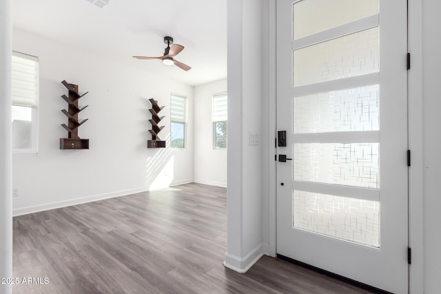 entryway with ceiling fan and hardwood / wood-style floors