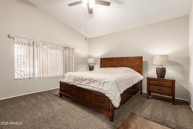 carpeted bedroom with baseboards, ceiling fan, and high vaulted ceiling
