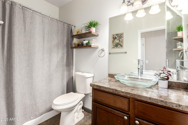 bathroom featuring vanity, a shower with curtain, and toilet