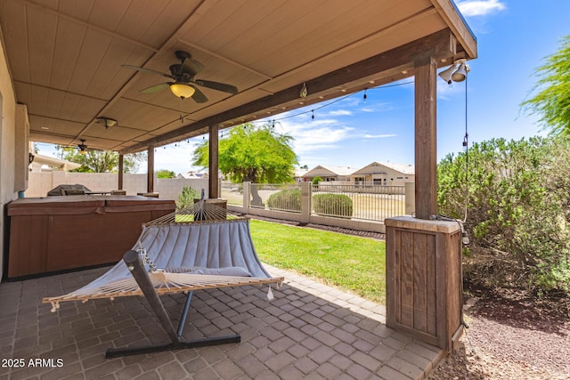 view of patio / terrace with a fenced backyard and ceiling fan