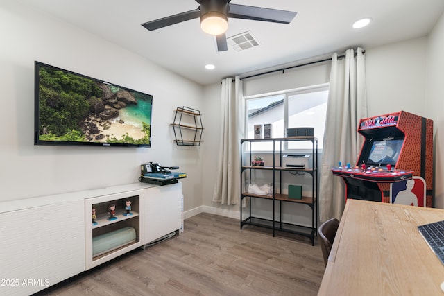 interior space with ceiling fan, recessed lighting, wood finished floors, visible vents, and baseboards