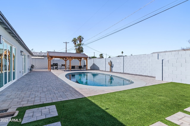 view of swimming pool featuring a patio, a fenced backyard, a gazebo, a lawn, and a fenced in pool