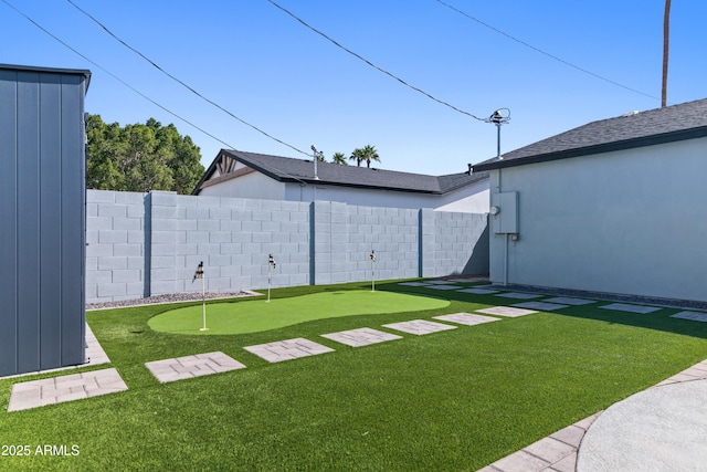 view of yard with a fenced backyard