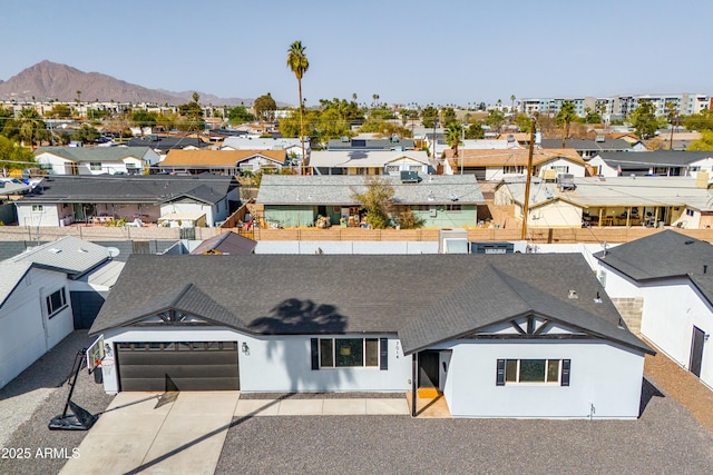 aerial view with a residential view and a mountain view