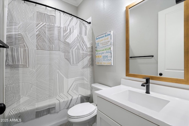 bathroom featuring shower / tub combo with curtain, toilet, and vanity