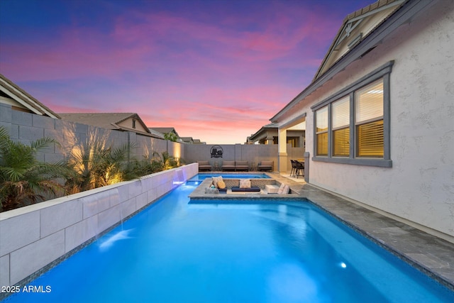 view of swimming pool with a patio area, a fenced in pool, an in ground hot tub, and a fenced backyard